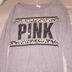 Pink long sleeve blouse.